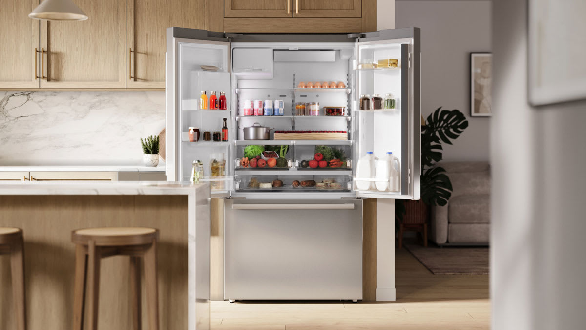 Modern kitchen with stainless steel refrigerator installation